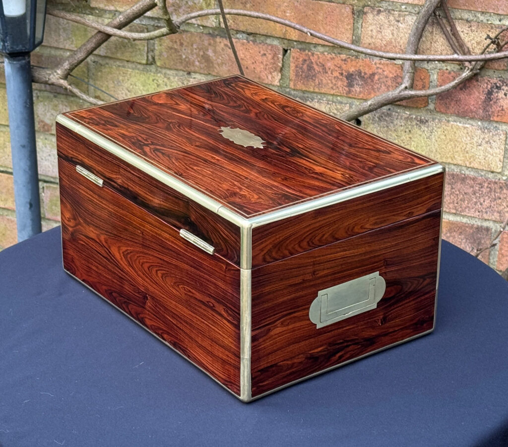 Rear left view of an Antique Jewellery Box in Kingwood, by Green of Oxford Street.