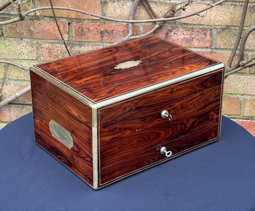 Front left view of an Antique Jewellery Box in Kingwood, by Green of Oxford Street.