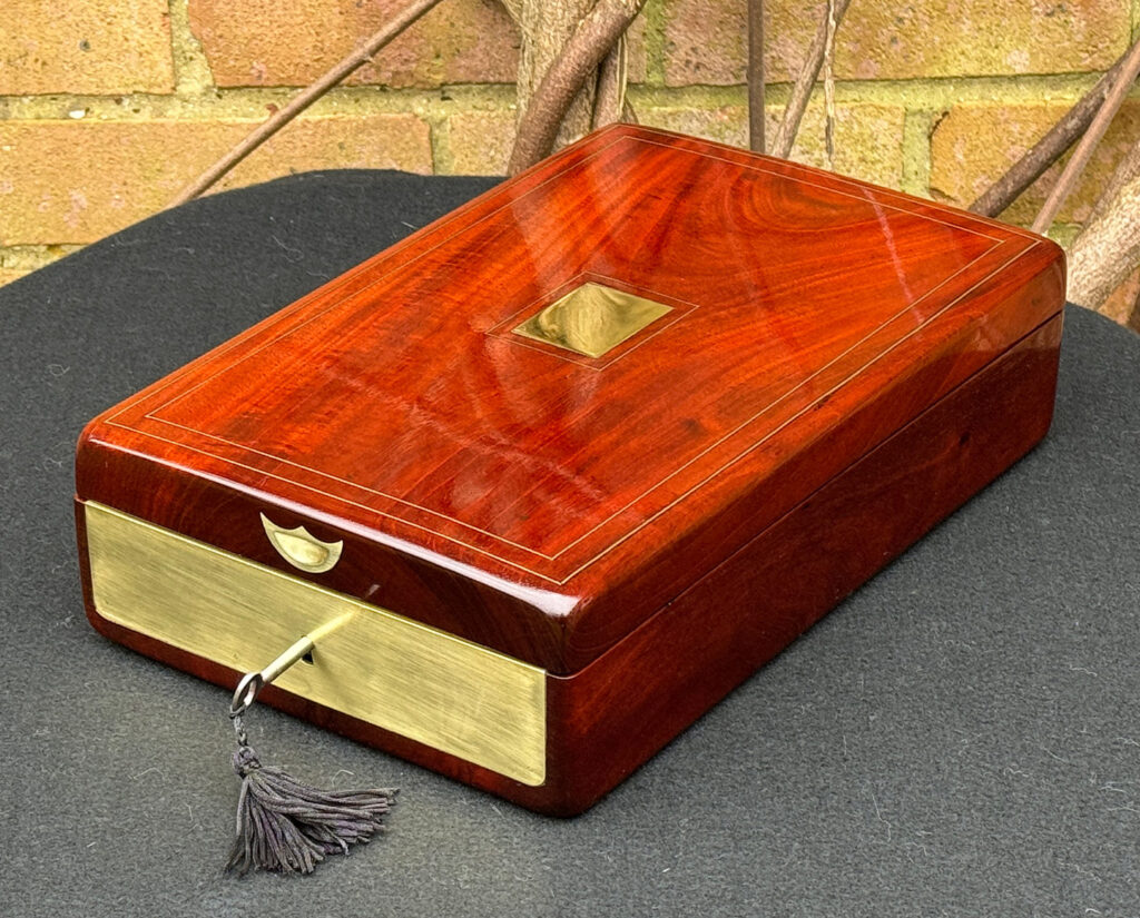 Front right view of a Large French Antique Travelling Jewellery Box in Cuban Mahogany.