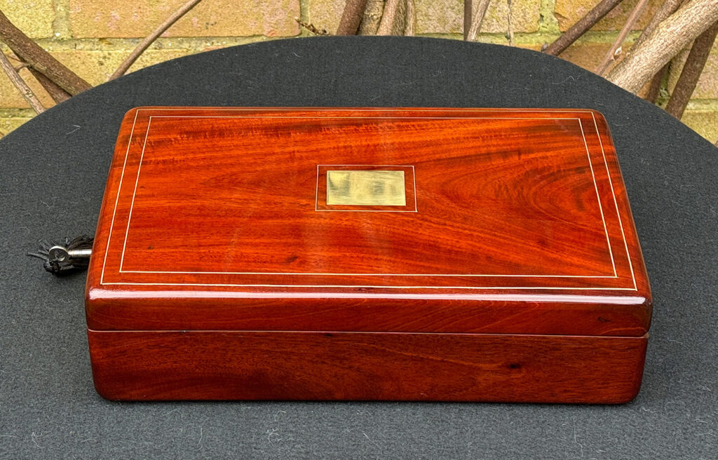 Right side view of a Large French Antique Travelling Jewellery Box in Cuban Mahogany.