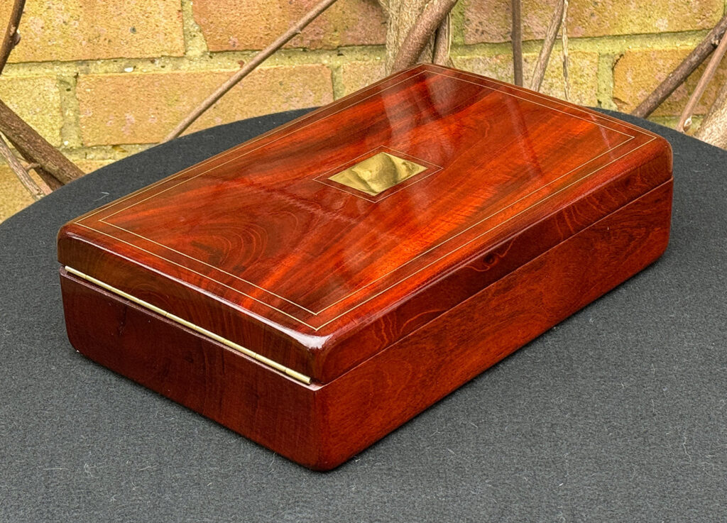 Rear left view of a Large French Antique Travelling Jewellery Box in Cuban Mahogany.