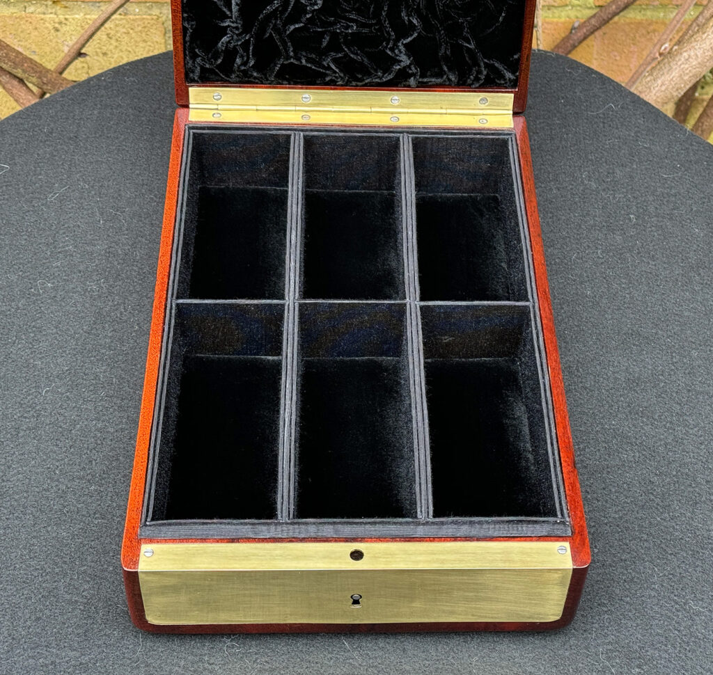 Top internal view of a Large French Antique Travelling Jewellery Box in Cuban Mahogany.