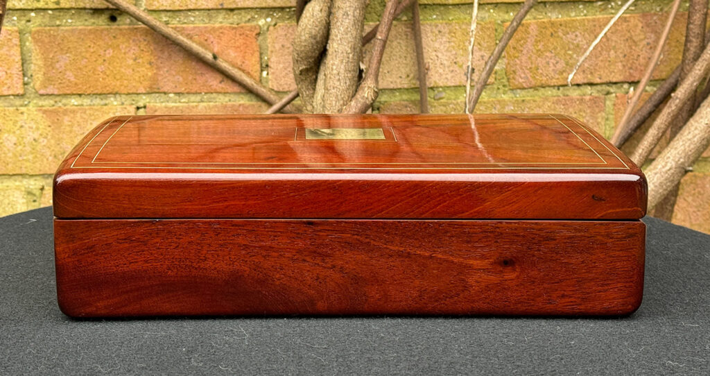Left side view of a Large French Antique Travelling Jewellery Box in Cuban Mahogany.
