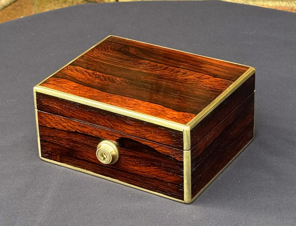 Front right view of a Miniature Antique Jewellery Box in Rosewood, by Edwards.