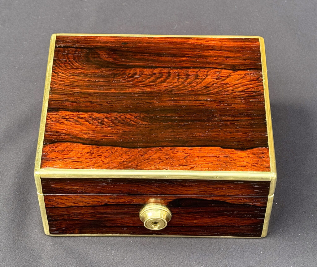 Top view of a Miniature Antique Jewellery Box in Rosewood, by Edwards.