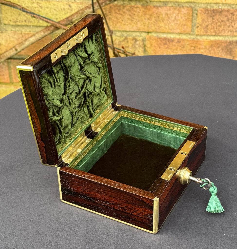 Left overhead internal view of a Miniature Antique Jewellery Box in Rosewood, by Edwards.
