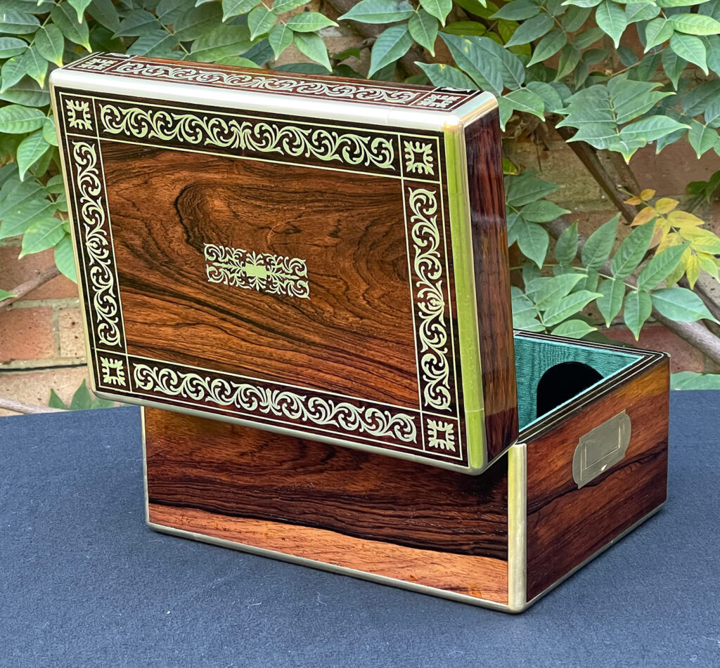 Rear open view of an Antique Jewellery Box in Rosewood with Scrollwork Brass Inlay.