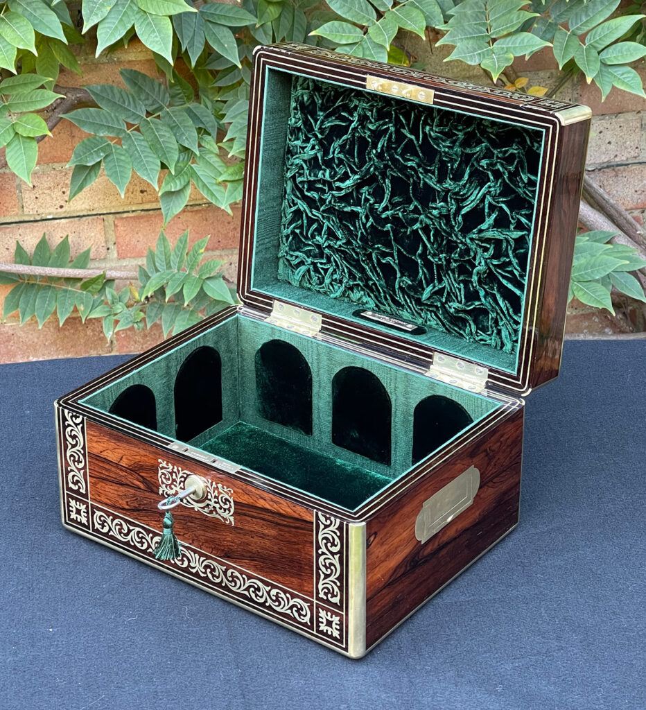 Front right internal view of an Antique Jewellery Box in Rosewood with Scrollwork Brass Inlay.