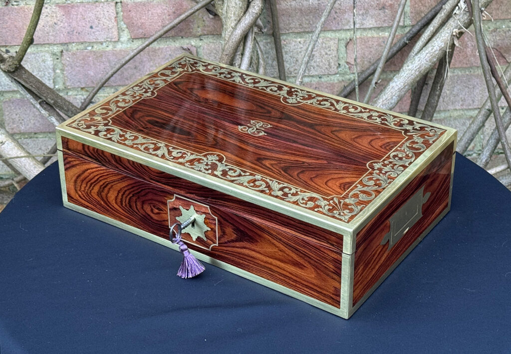Front right view of an Antique Jewellery Box in Kingwood with Brass Inlay, by Wells and Lambe.