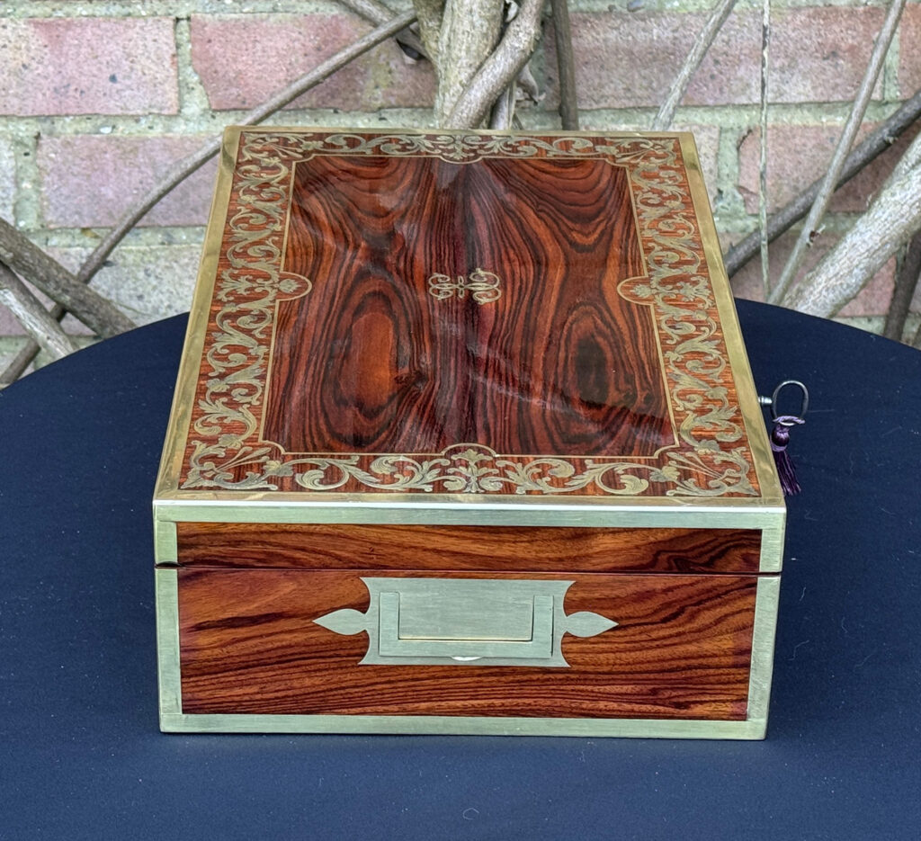 Left side view of an Antique Jewellery Box in Kingwood with Brass Inlay, by Wells and Lambe.