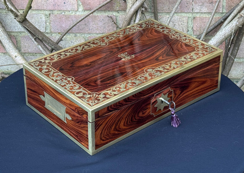 Front left view of an Antique Jewellery Box in Kingwood with Brass Inlay, by Wells and Lambe.