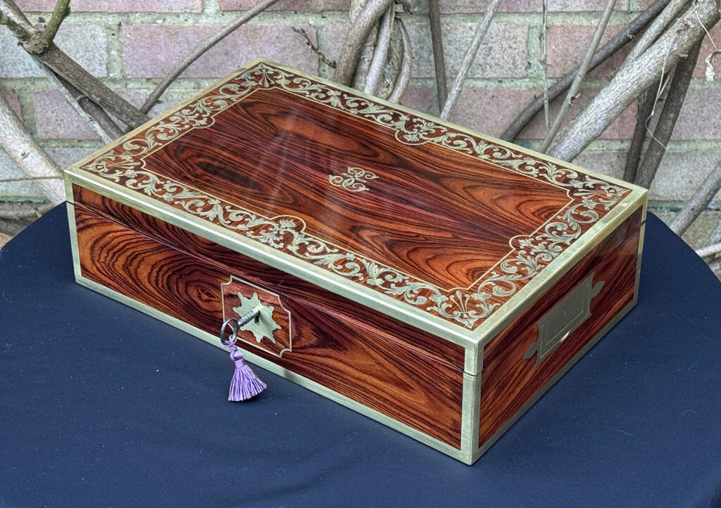 Front right view of an Antique Jewellery Box in Kingwood with Brass Inlay, by Wells and Lambe.