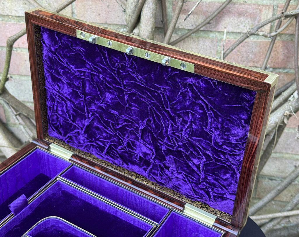 Close up of velvet ruching from an Antique Jewellery Box in Kingwood with Brass Inlay, by Wells and Lambe.