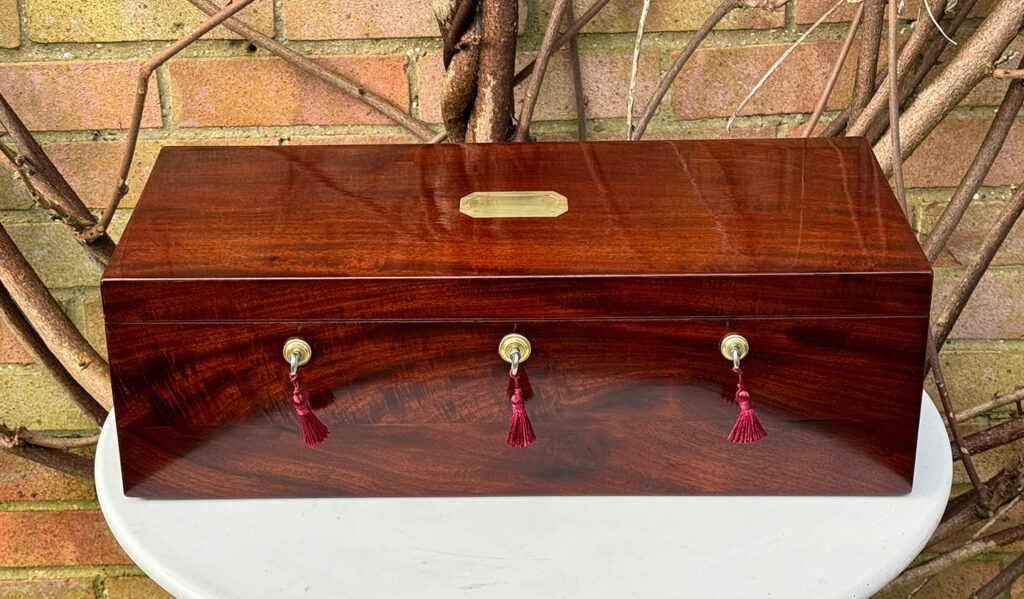 Front view of a Large Antique Jewellery Strong Box with Three Bramah Locks.