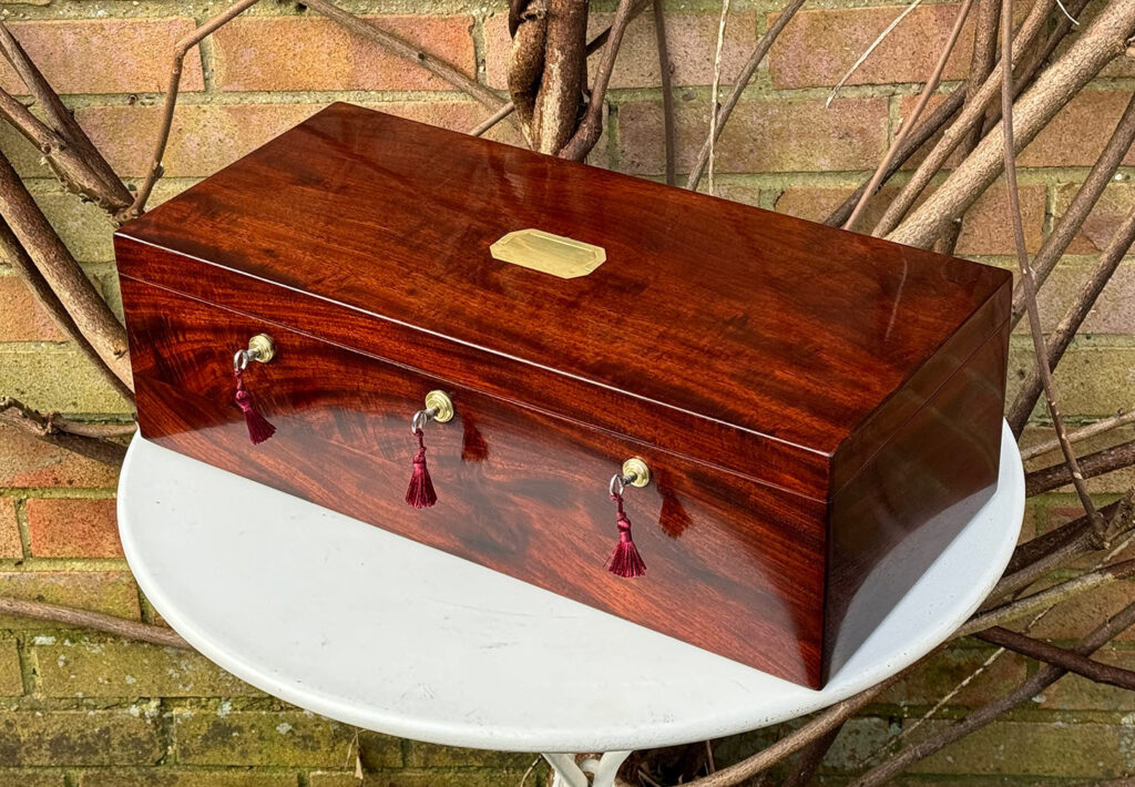 Front right overhead view of a Large Antique Jewellery Strong Box with Three Bramah Locks.