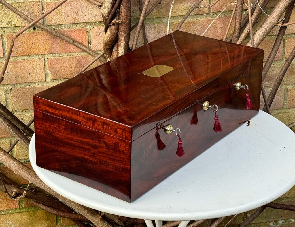Front left view of a Large Antique Jewellery Strong Box with Three Bramah Locks.