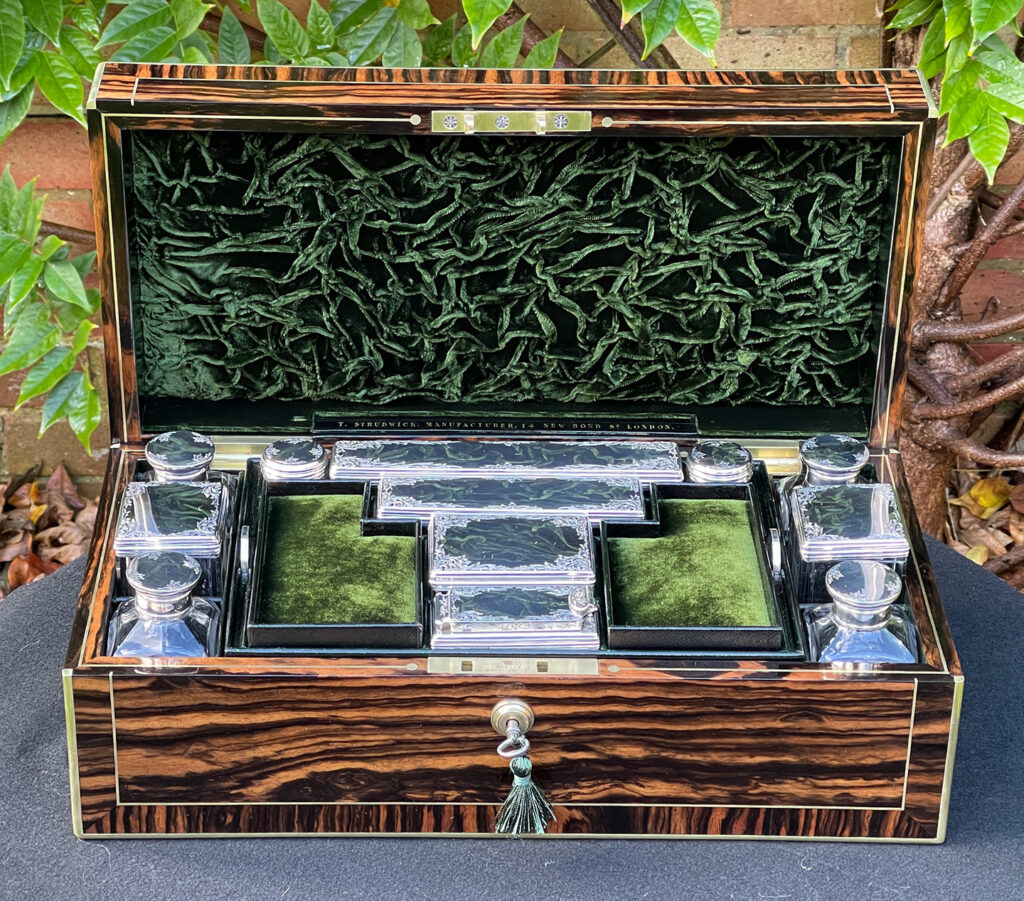 Front internal view of an Antique Silver Mounted Dressing Case in Calamander, by Thomas Strudwick.