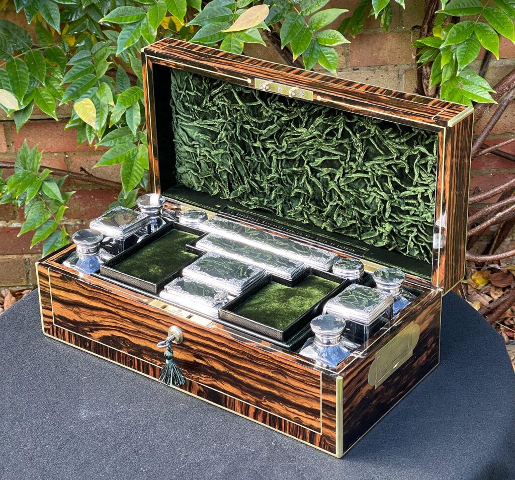 Front right internal view of an Antique Silver Mounted Dressing Case in Calamander, by Thomas Strudwick.