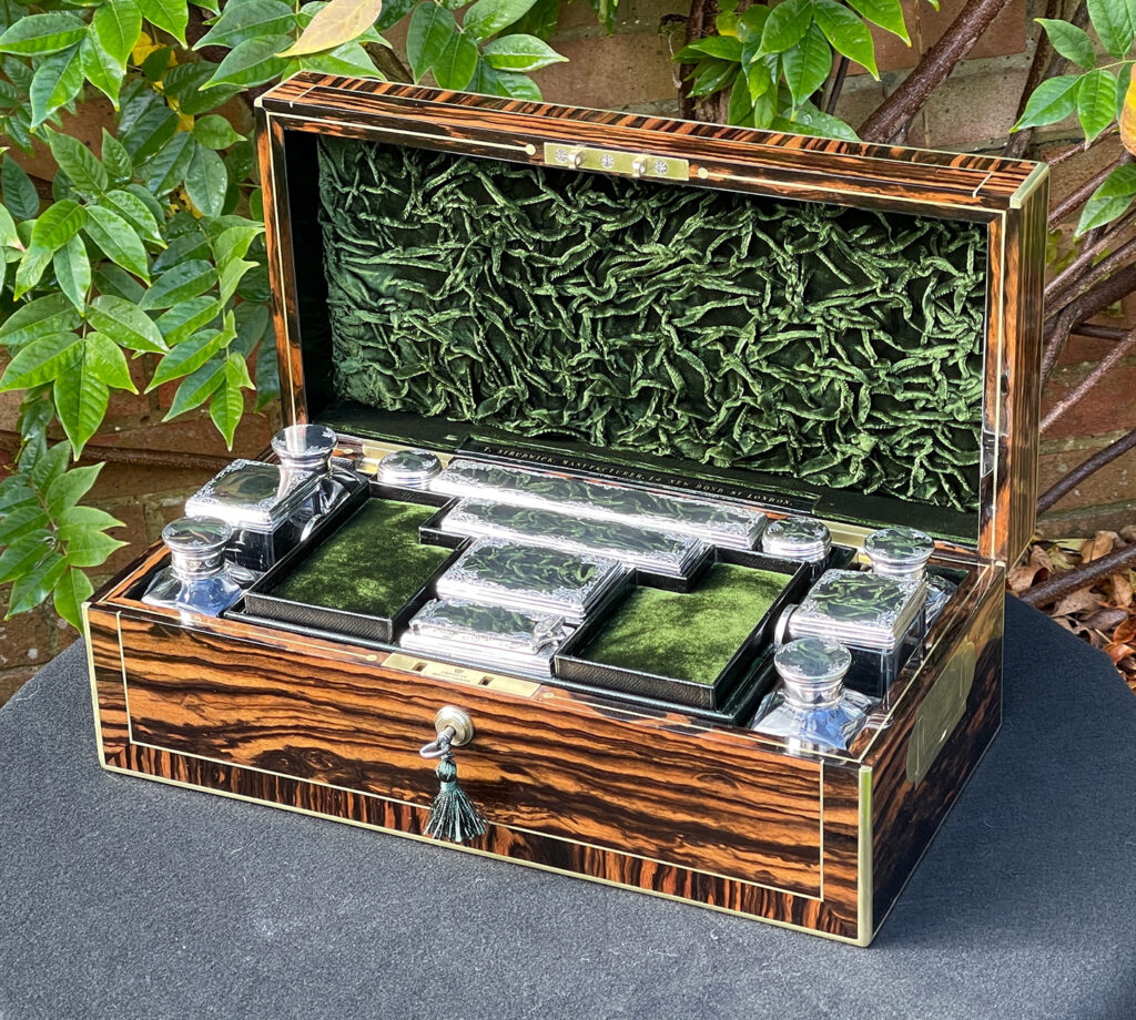 Front right internal view of an Antique Silver Mounted Dressing Case in Calamander, by Thomas Strudwick.