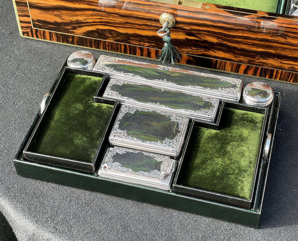 Close up of the main tray from an Antique Silver Mounted Dressing Case in Calamander, by Thomas Strudwick.