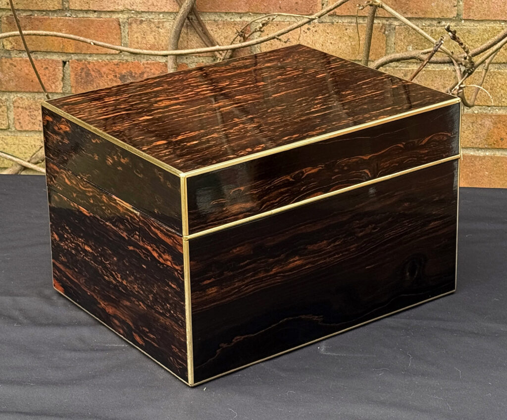 Rear right view of an Antique Jewellery Box in Coromandel with Betjemann Patent Automatic Mechanism.