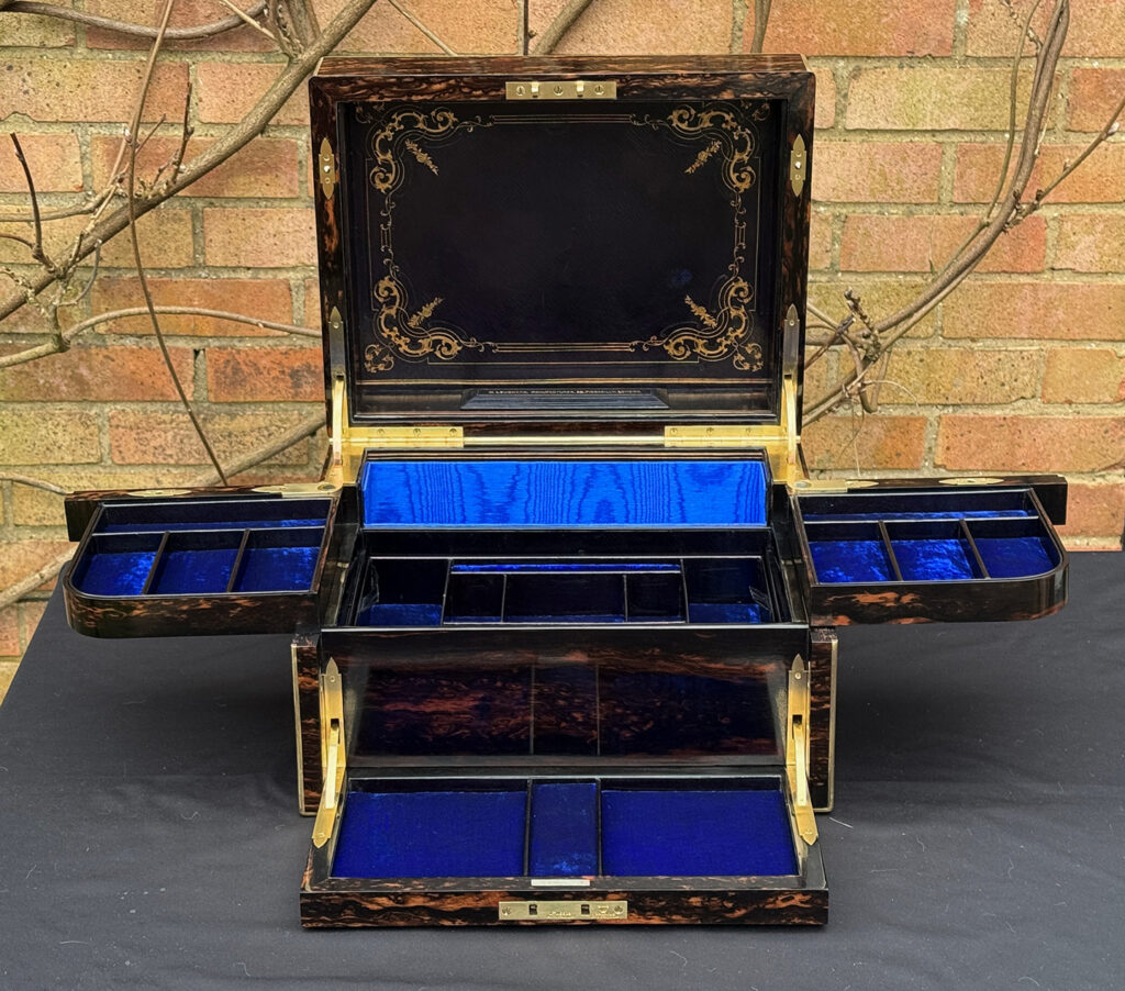 Front internal view of an Antique Jewellery Box in Coromandel with Betjemann Patent Automatic Mechanism.