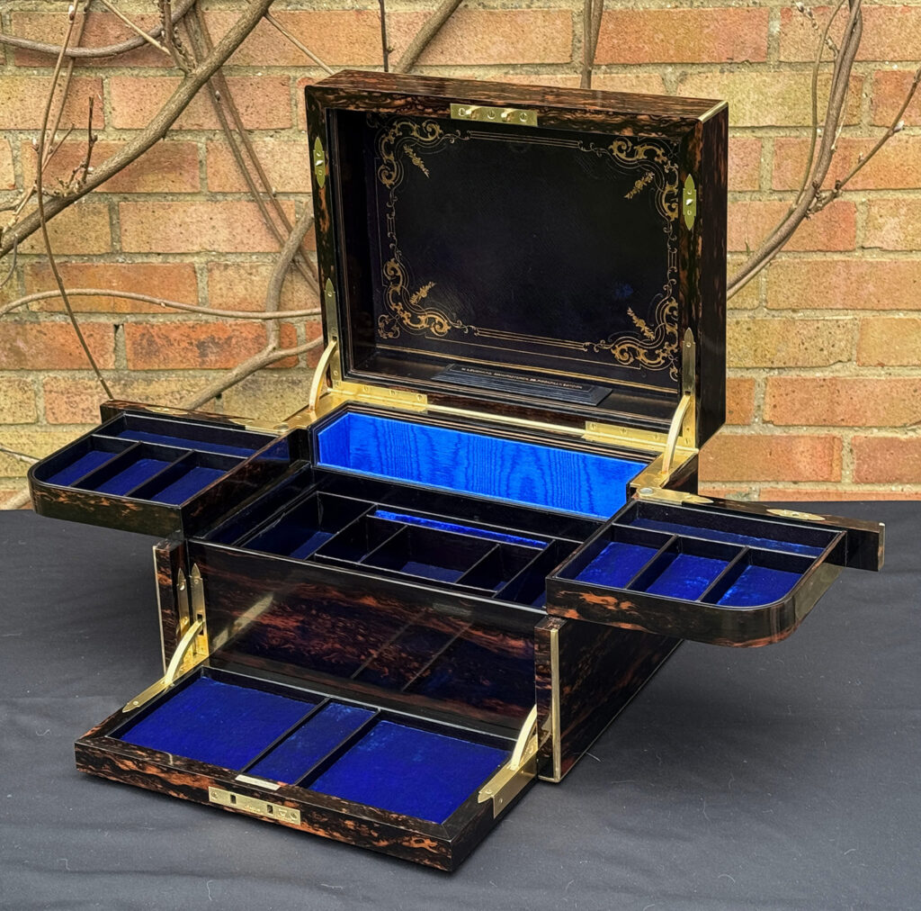 Front right internal view of an Antique Jewellery Box in Coromandel with Betjemann Patent Automatic Mechanism.
