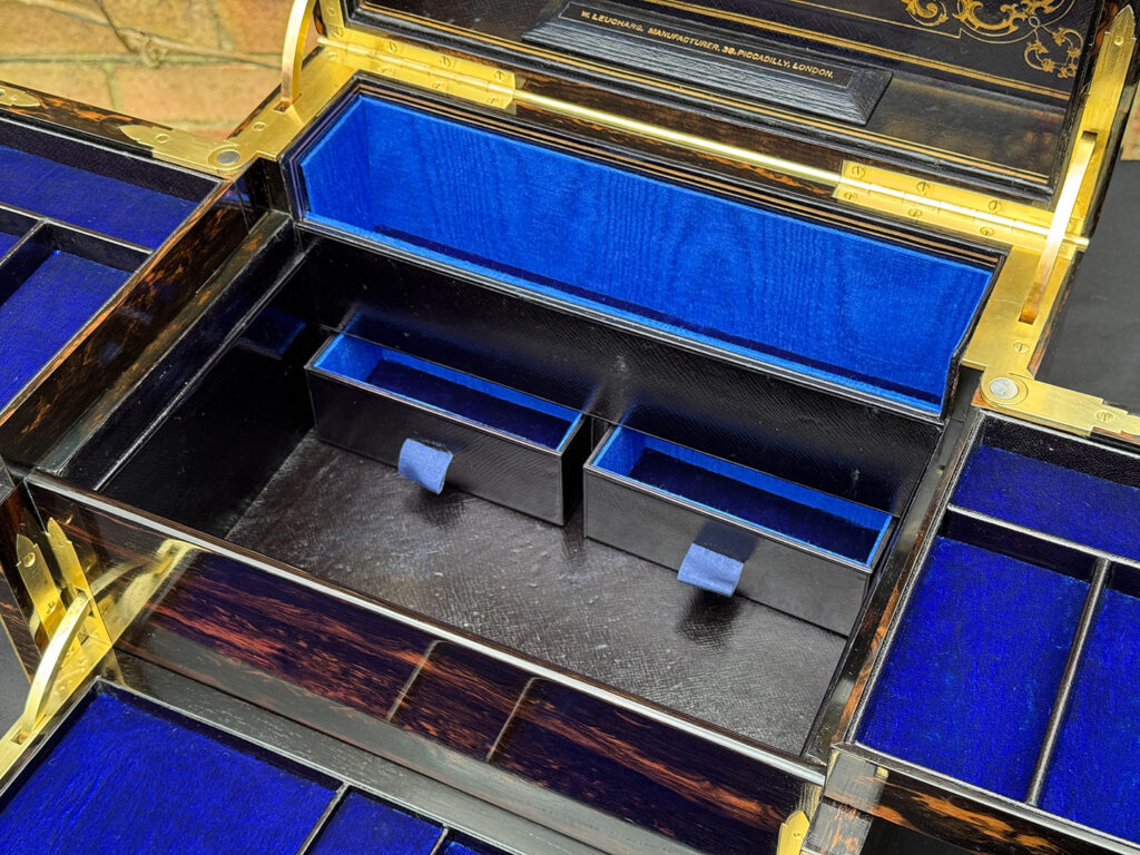 Concealed drawers from an Antique Jewellery Box in Coromandel with Betjemann Patent Automatic Mechanism.