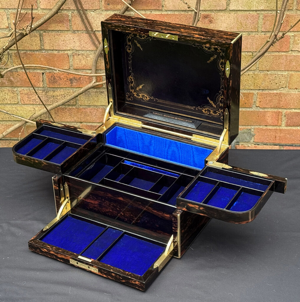 Front right internal view of an Antique Jewellery Box in Coromandel with Betjemann Patent Automatic Mechanism.