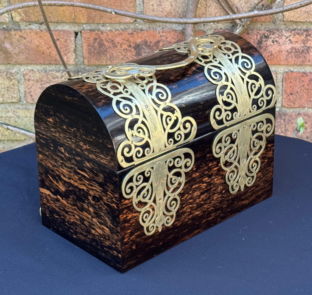 Rear right view of an Antique Jewellery Box in Coromandel With Engraved Brass Overlay.