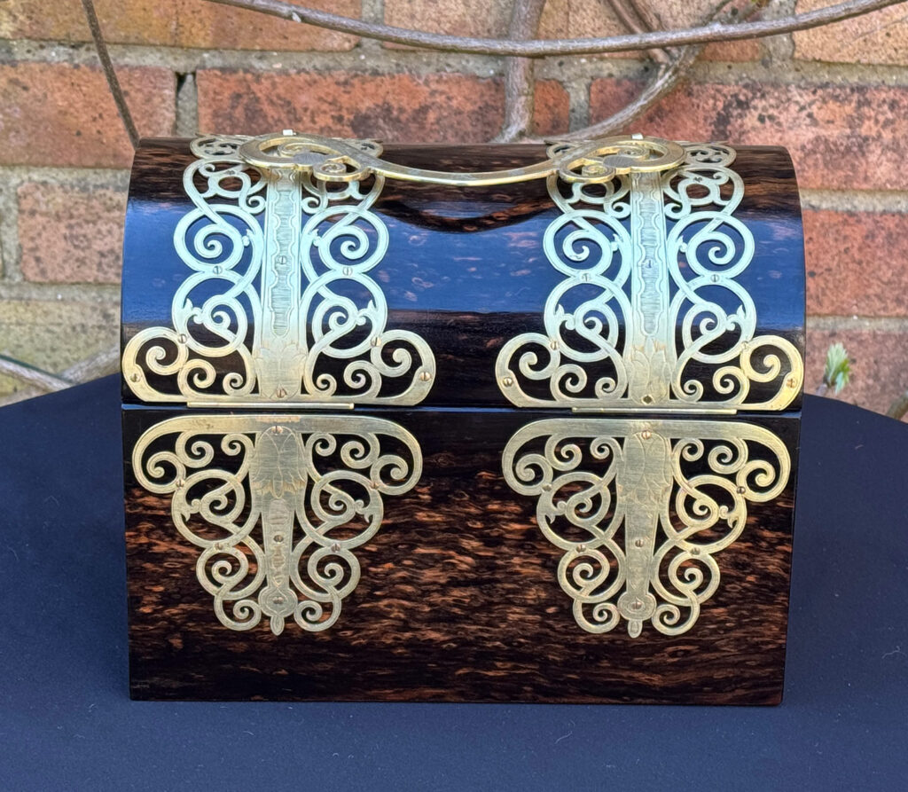 Rear view of an Antique Jewellery Box in Coromandel With Engraved Brass Overlay.