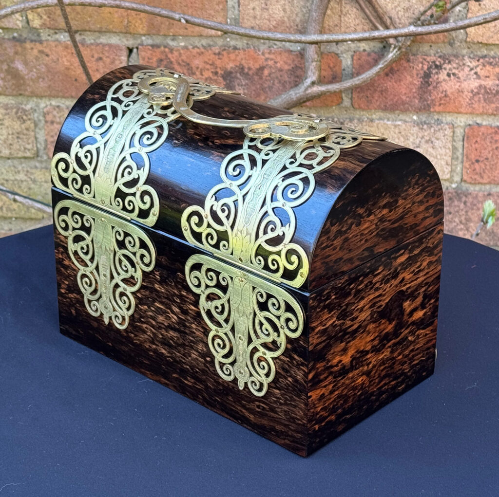 Rear left view of an Antique Jewellery Box in Coromandel With Engraved Brass Overlay.