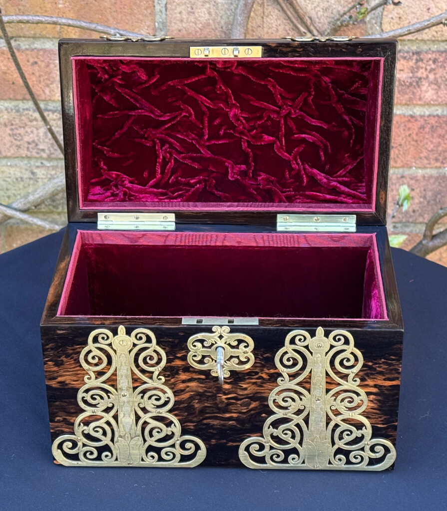 Front internal view of an Antique Jewellery Box in Coromandel With Engraved Brass Overlay.