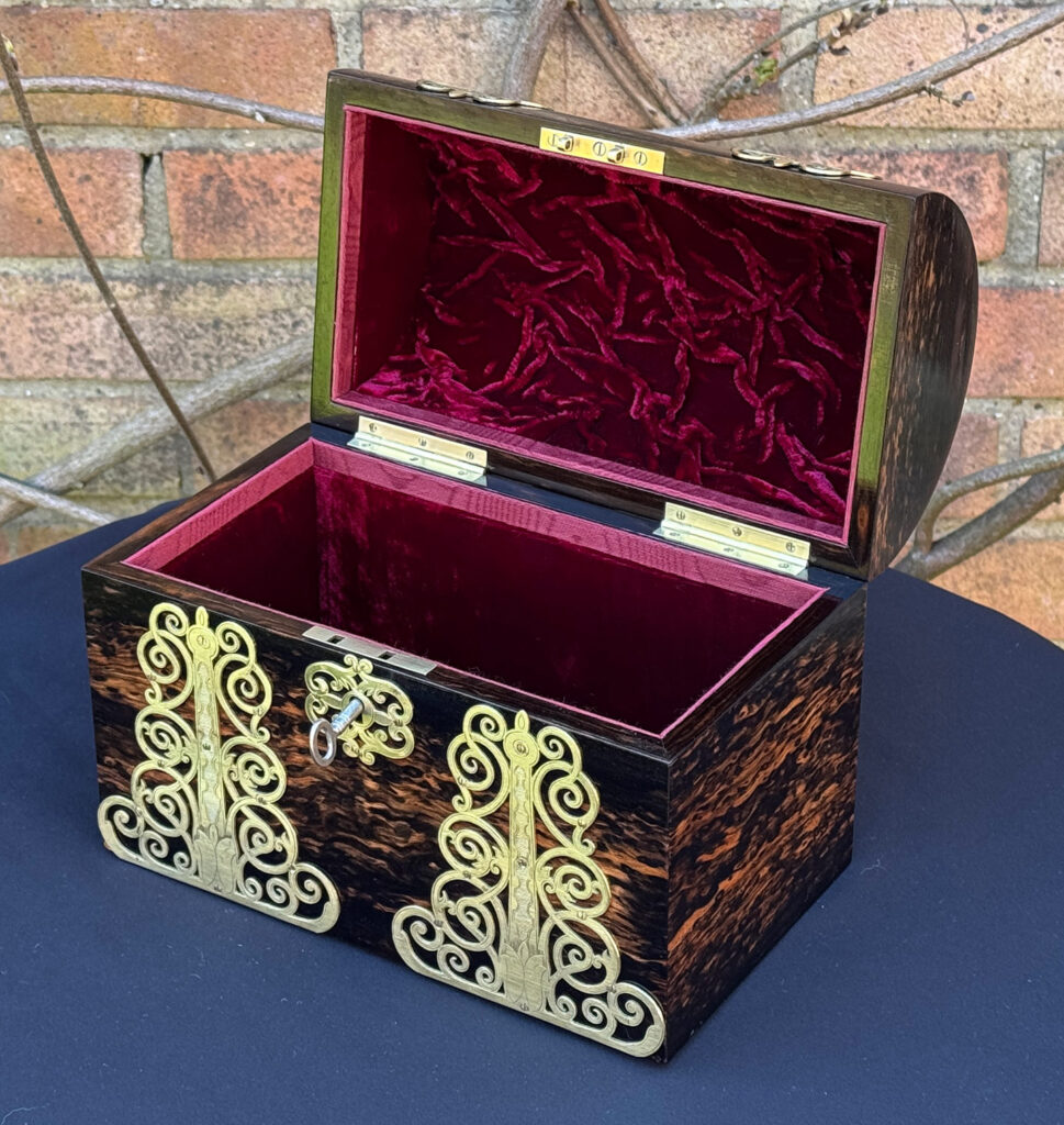 Front right internal view of an Antique Jewellery Box in Coromandel With Engraved Brass Overlay.