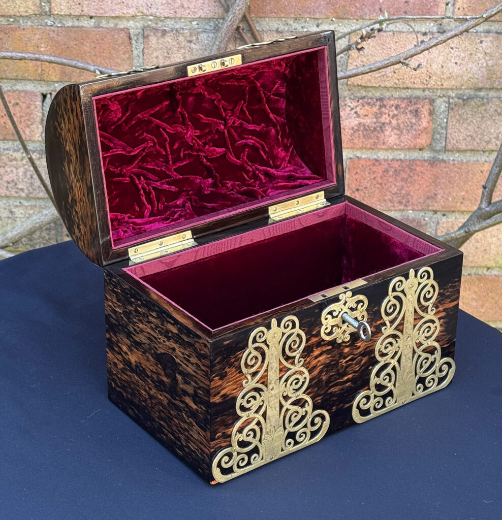 Front left internal view of an Antique Jewellery Box in Coromandel With Engraved Brass Overlay.