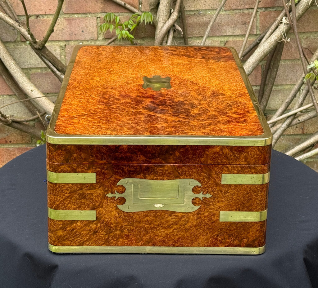 Right side view of an Extra Large Antique Jewellery Box in Solid Amboyna, by Asprey.