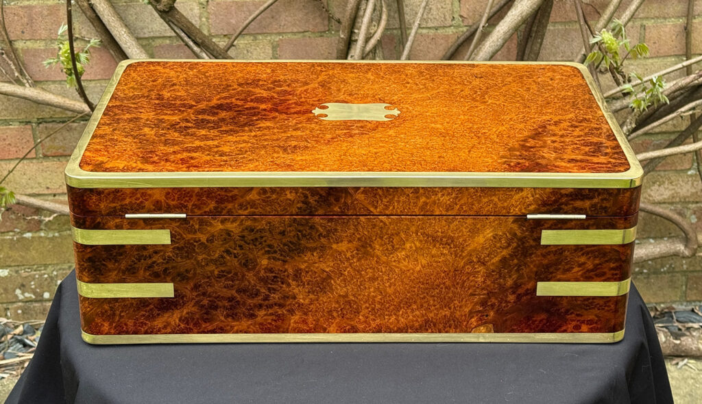 Rear view of an Extra Large Antique Jewellery Box in Solid Amboyna, by Asprey.