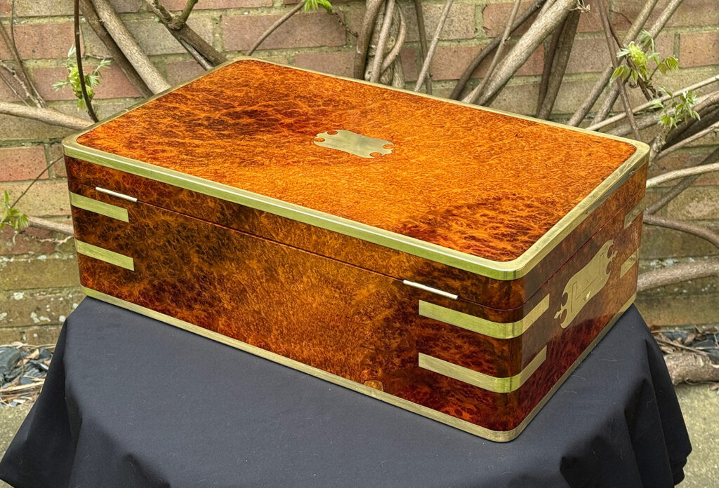 Rear left view of an Extra Large Antique Jewellery Box in Solid Amboyna, by Asprey.