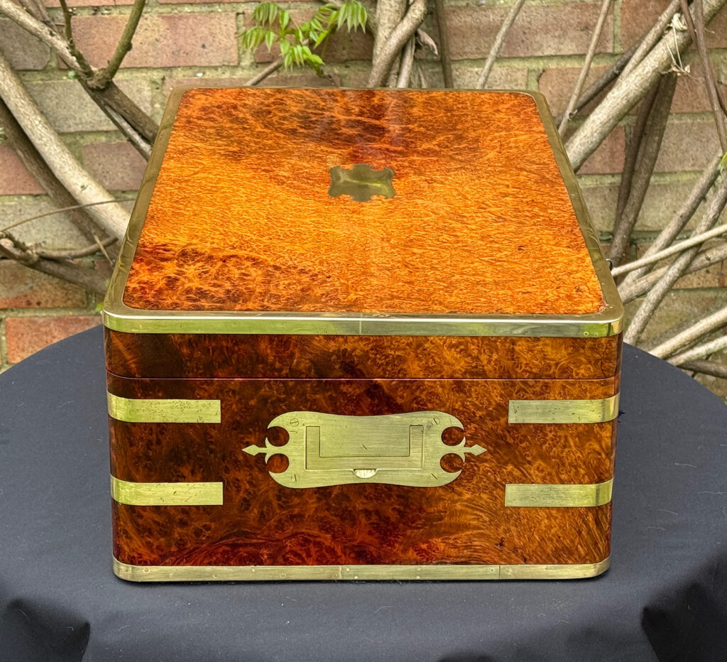 Left side view of an Extra Large Antique Jewellery Box in Solid Amboyna, by Asprey.