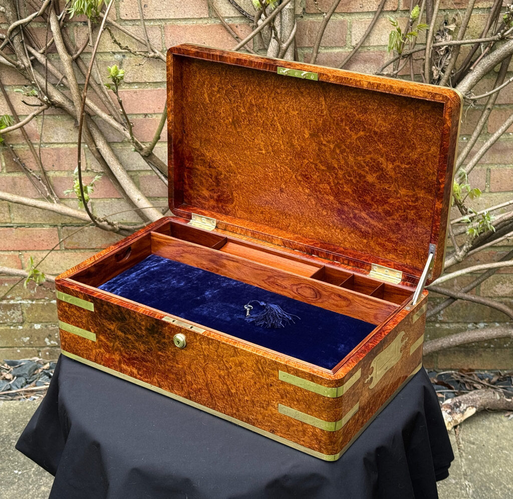 Front right internal view of an Extra Large Antique Jewellery Box in Solid Amboyna, by Asprey.