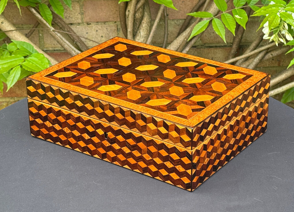 Front right view of an Antique Jewellery Box with Parquetry Inlay.