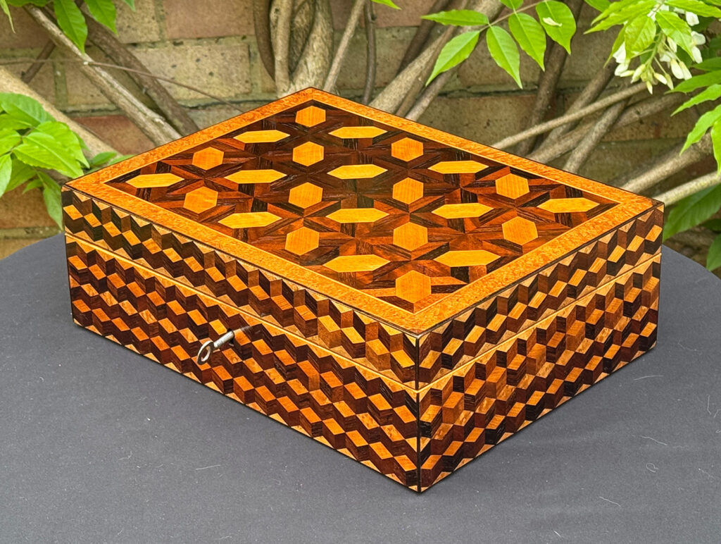 Front right view of an Antique Jewellery Box with Parquetry Inlay.