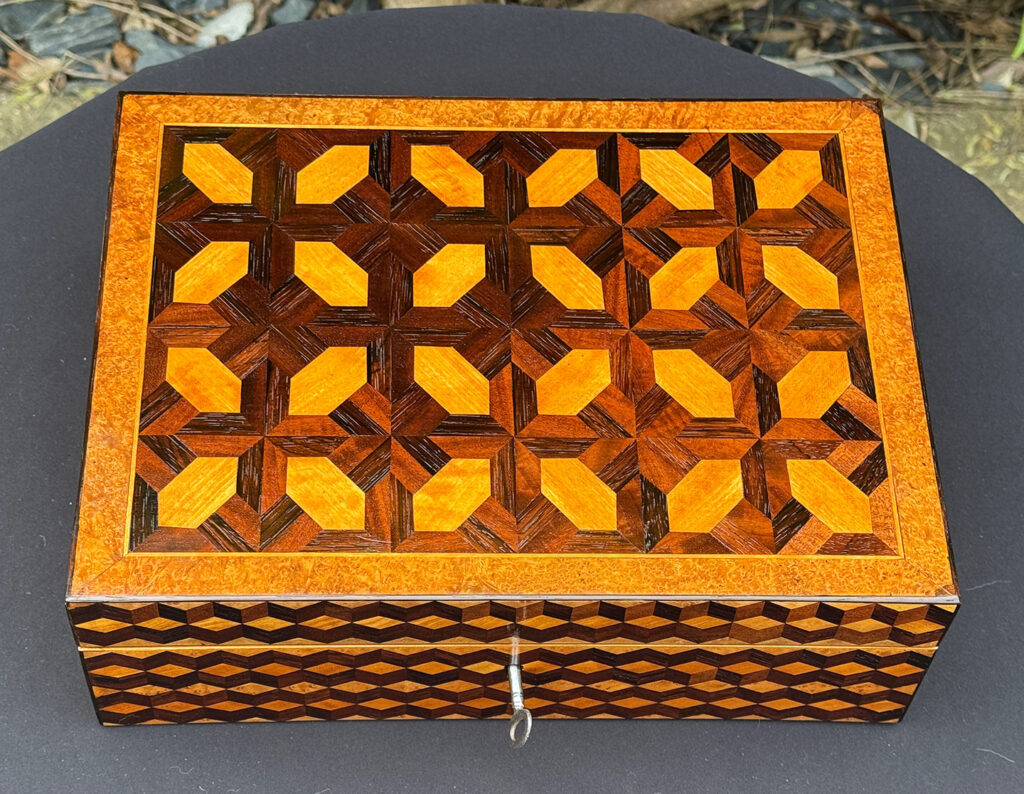 Top view of an Antique Jewellery Box with Parquetry Inlay.