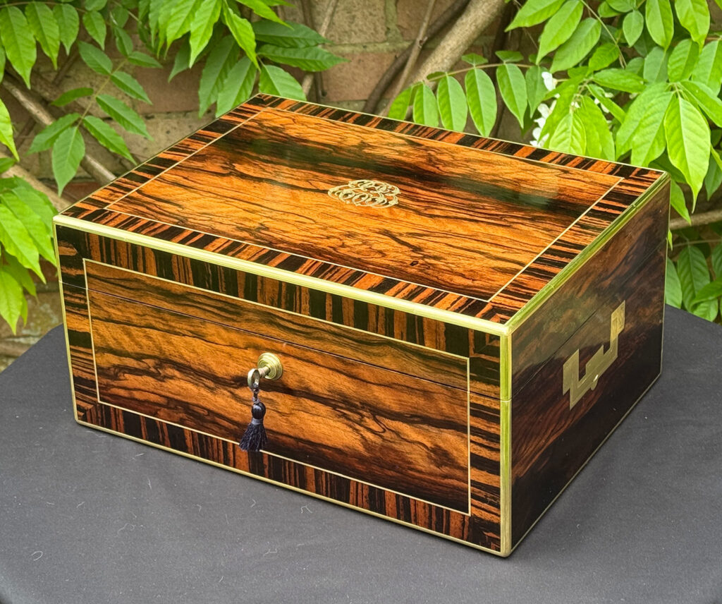 Front right view of an Antique Jewellery Box in Calamander, by Edwards.