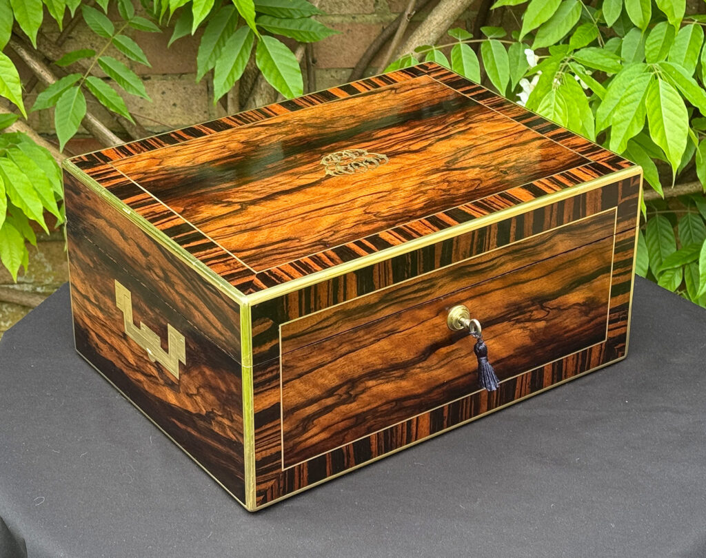 Front left view of an Antique Jewellery Box in Calamander, by Edwards.