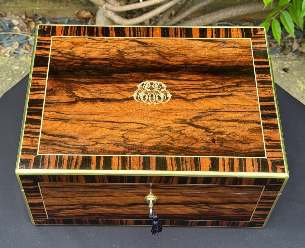 Top view of an Antique Jewellery Box in Calamander, by Edwards.