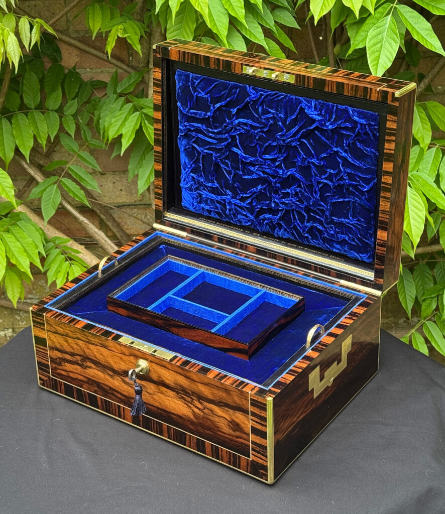 Front right internal view of an Antique Jewellery Box in Calamander, by Edwards.