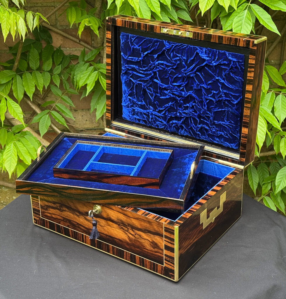 Front right internal view of an Antique Jewellery Box in Calamander, by Edwards with tray removed.