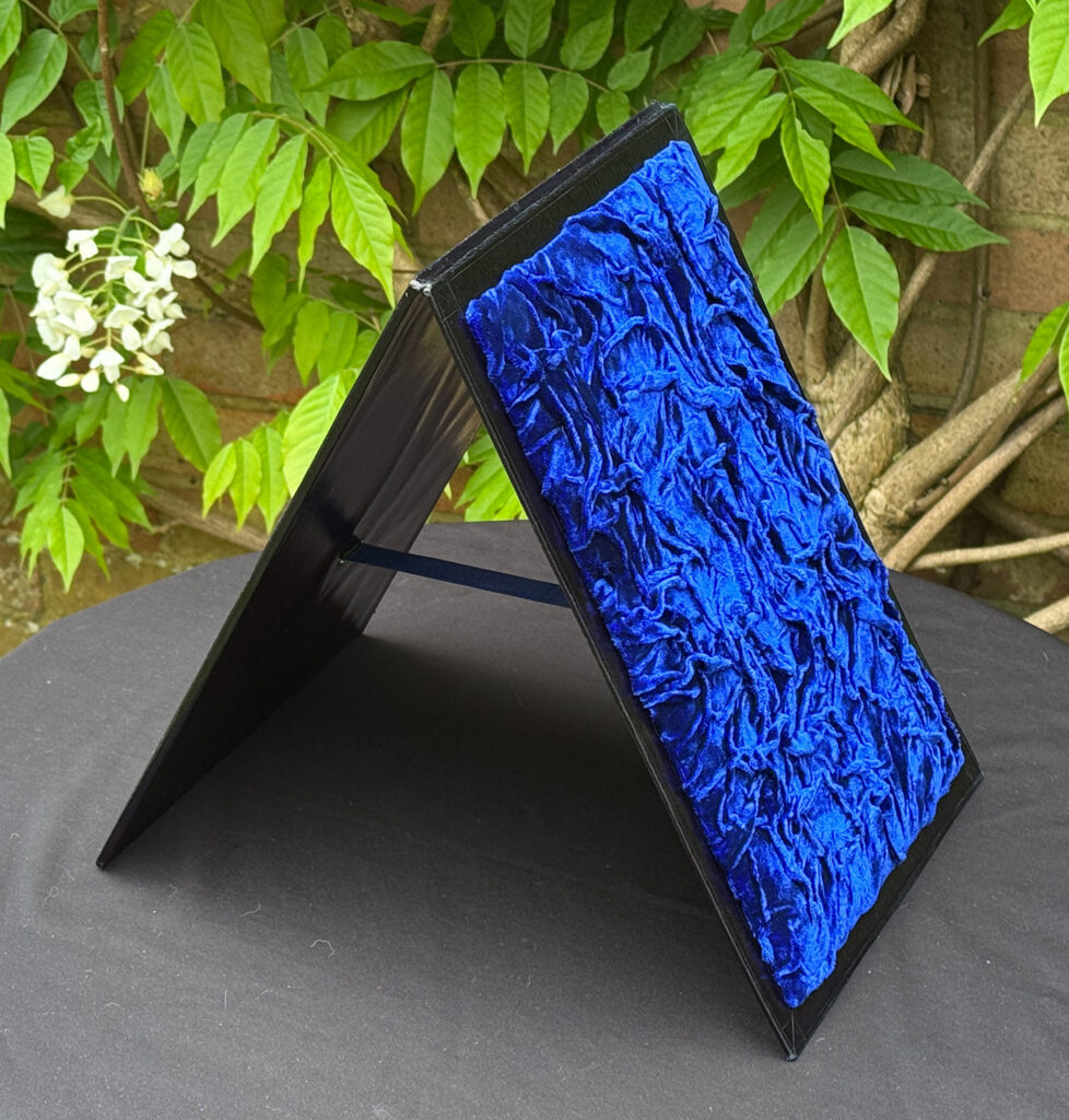 Rear view of the freestanding mirror from an Antique Jewellery Box in Calamander, by Edwards.