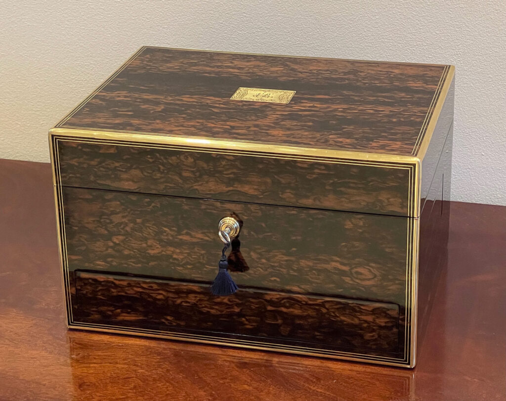 Front view of an Antique Silver Mounted Dressing Case in Coromandel, by William Tooke.